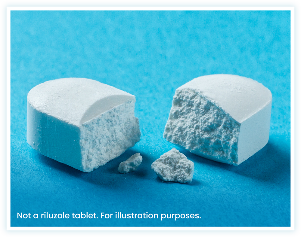 Crushed Tablet. (Not a riluzole tablet. For illustration purposes).
